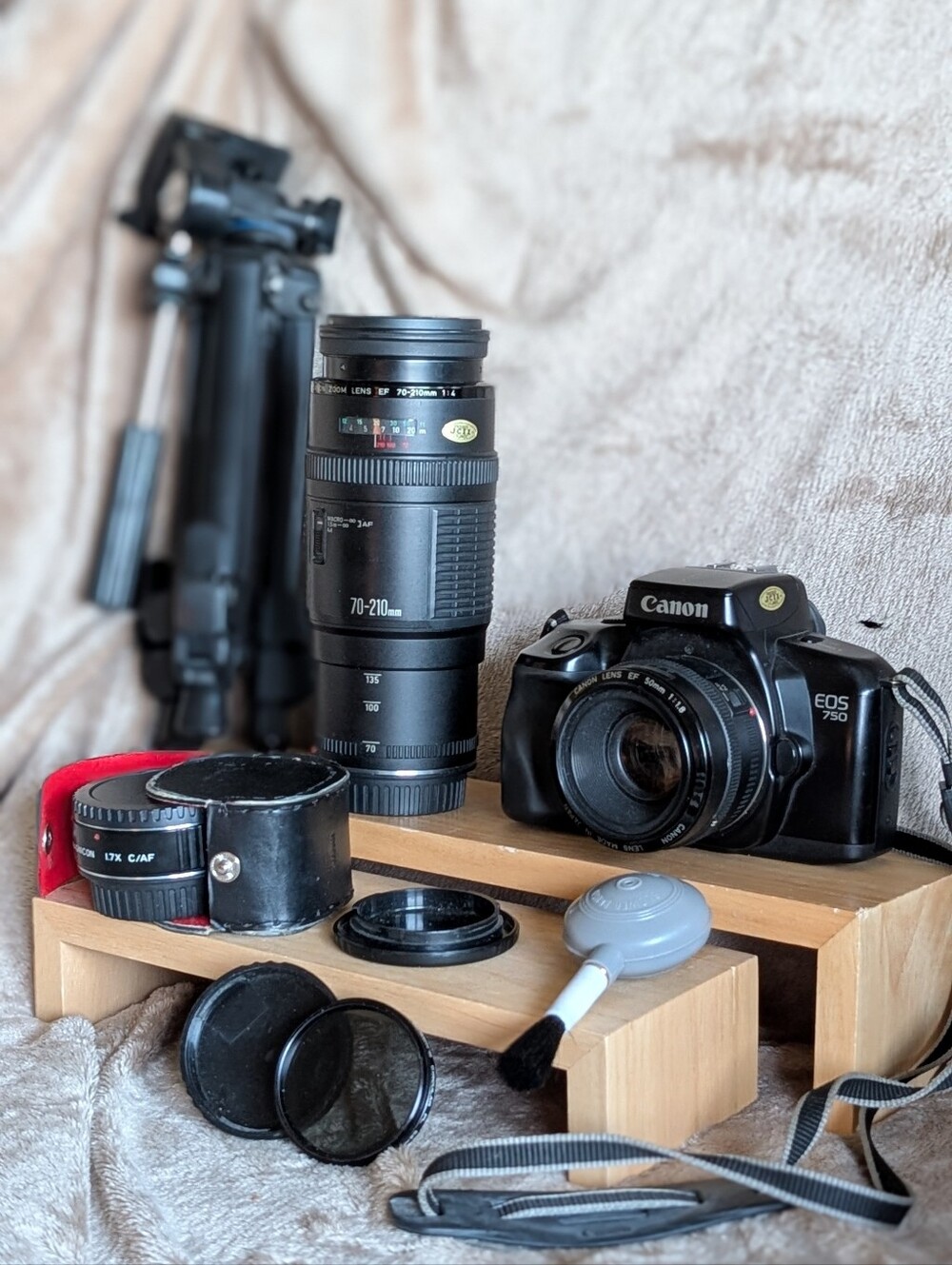 Photo Film Canon EOS 750 Black SLR Camera with Black 70-210mm Telephoto Lens.